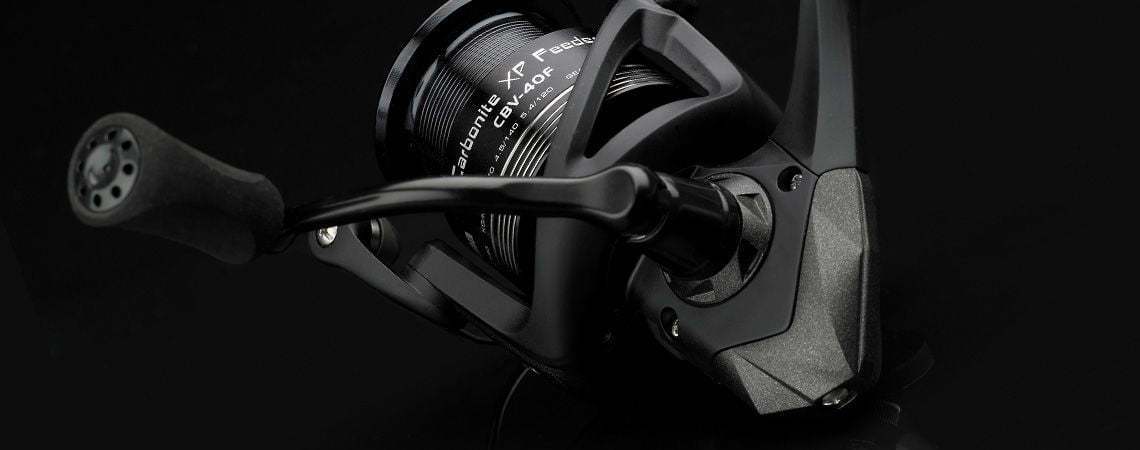 CARBONITE XP FEEDER REEL - Okuma Carbonite XP Feeder Reel-Precision Elliptical Gearing System-Cyclonic Flow Rotor-Rigid metal handle with EVA knob